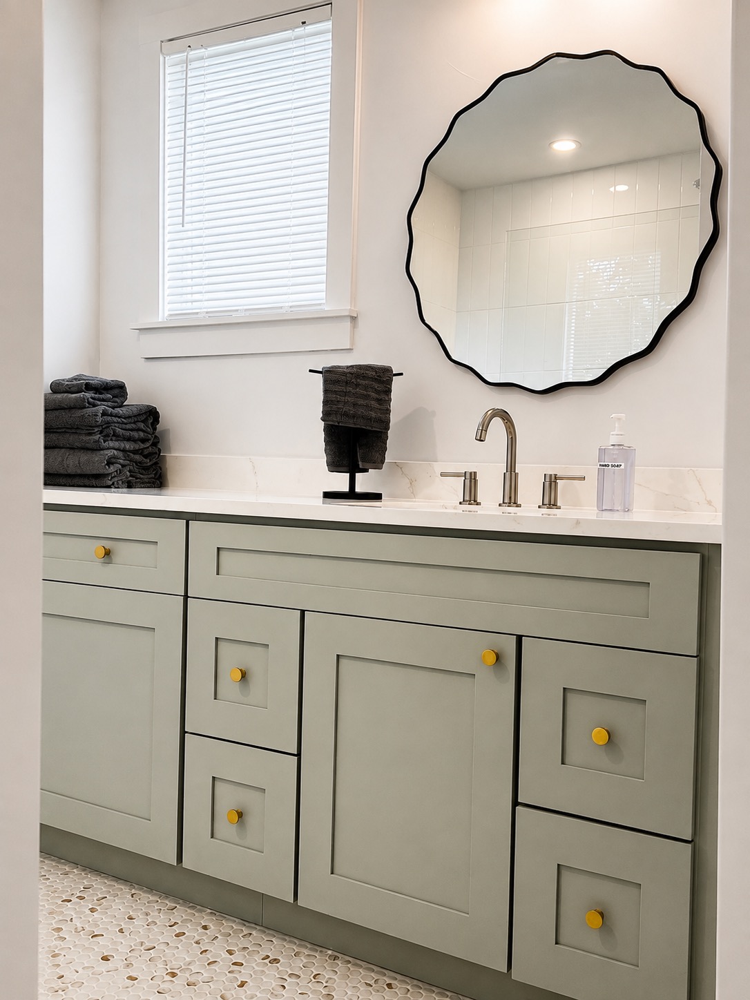 Bathroom vanity and window seen from the doorway