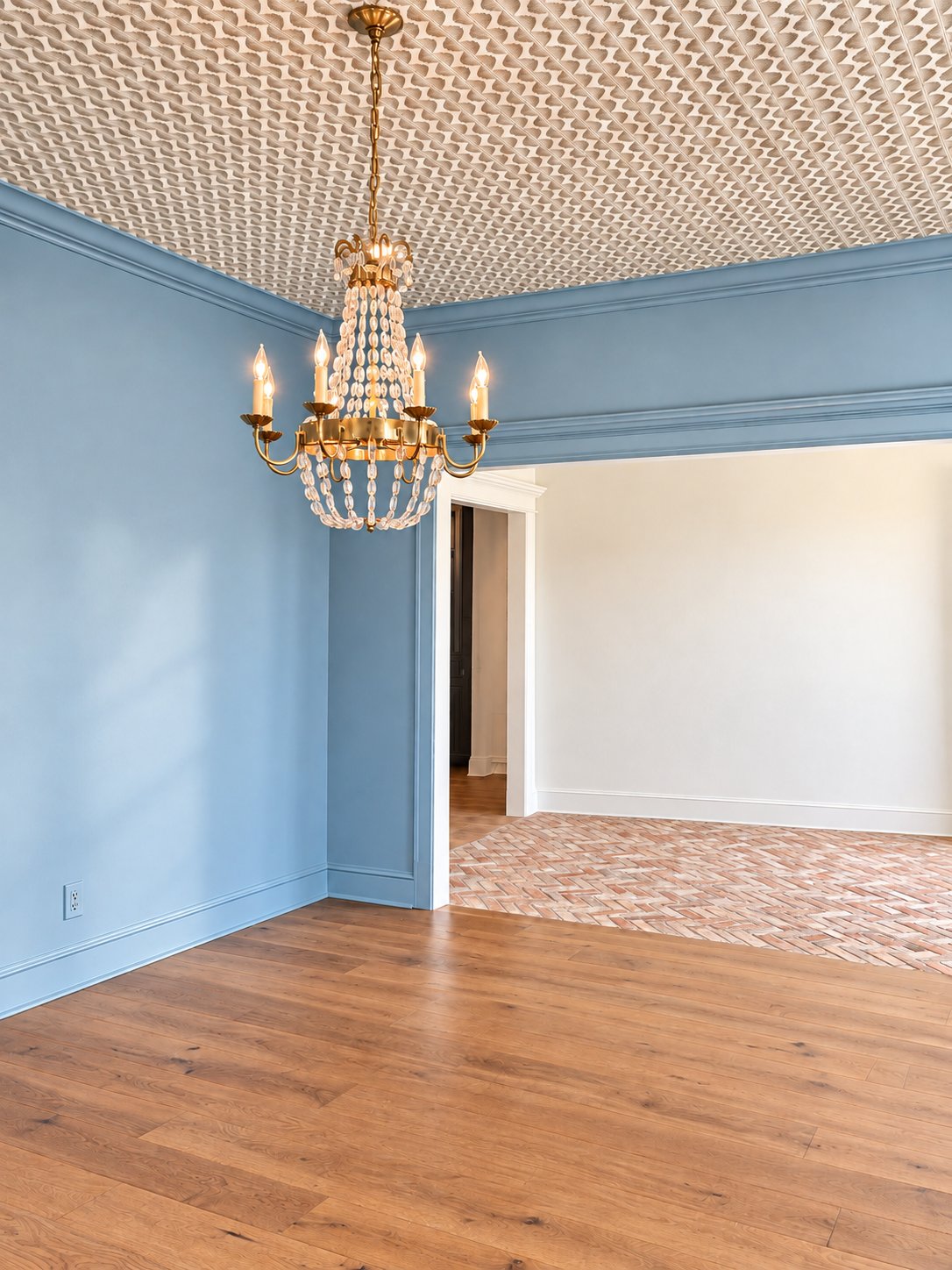 From the dining room toward the entry and its brick floor